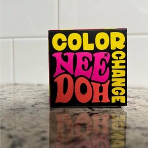 Color NEE DOH Color Change Toy - Bright Yellow, Pink, Red Packaging